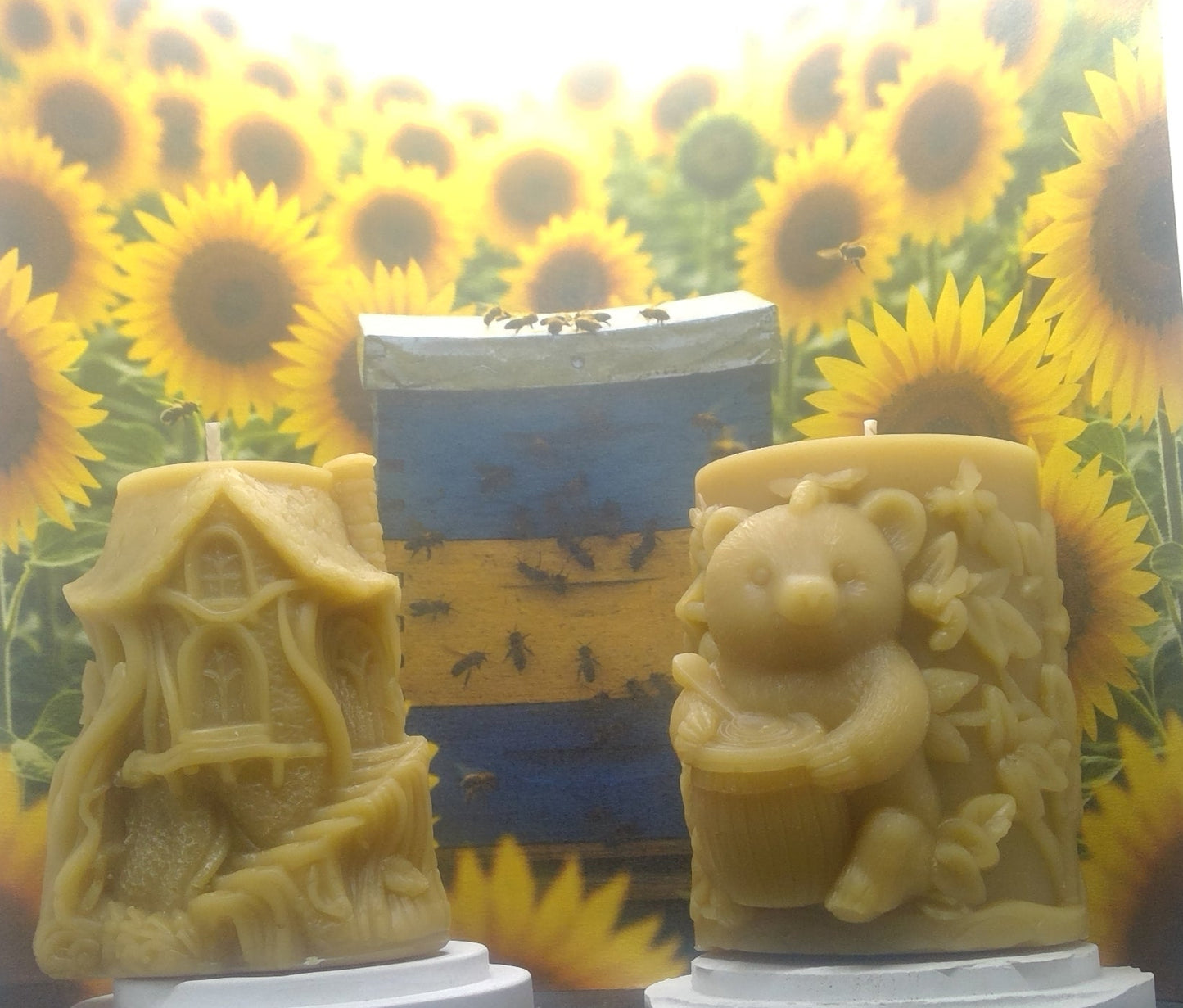 Golden yellow beeswax bear and cabin pillar candle