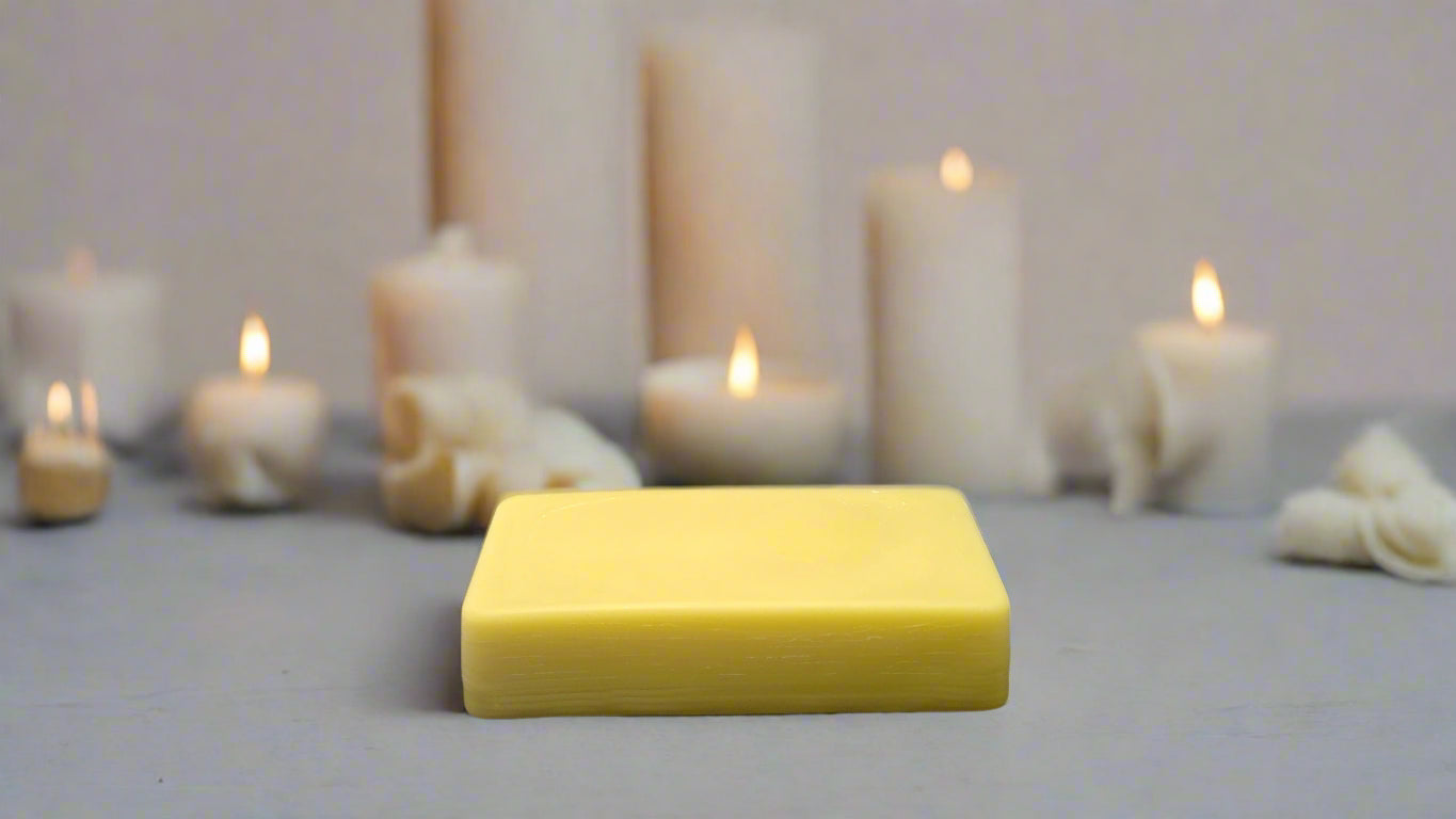 8 oz raw filtered golden beeswax bar for candle making and natural home crafts.