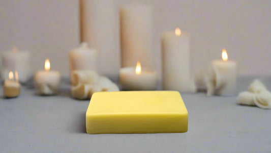 8 oz raw filtered golden beeswax bar for candle making and natural home crafts.