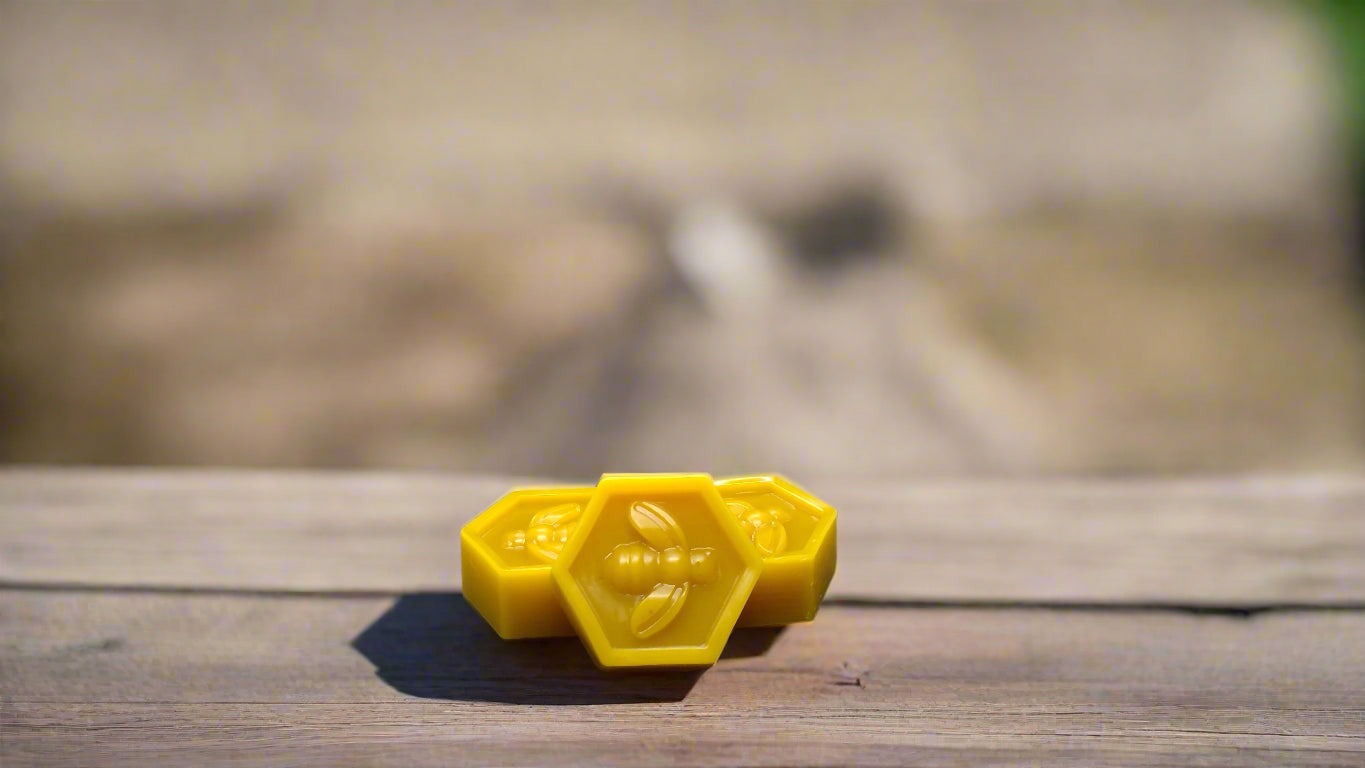 Raw, filtered, golden/yellow, beeswax bar for candle making, natural home crafts and cosmetics.