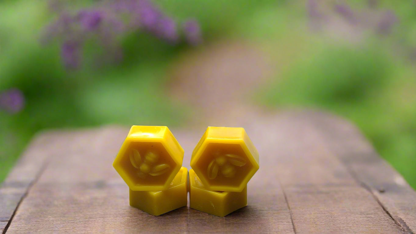 Raw, filtered, golden/yellow, beeswax bar for candle making, natural home crafts and cosmetics.