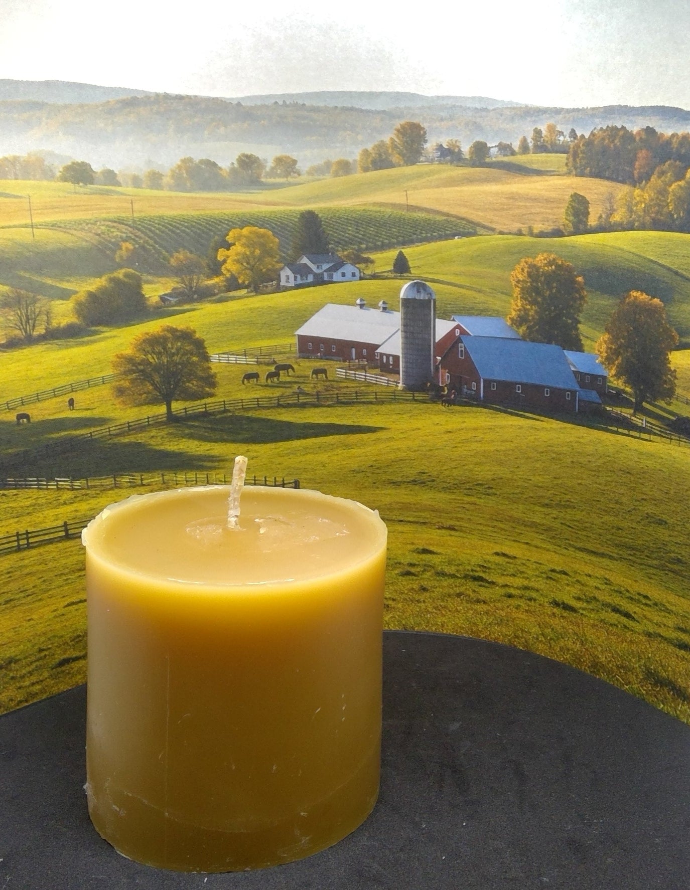 Golden yellow beeswax pillar cylinder candle