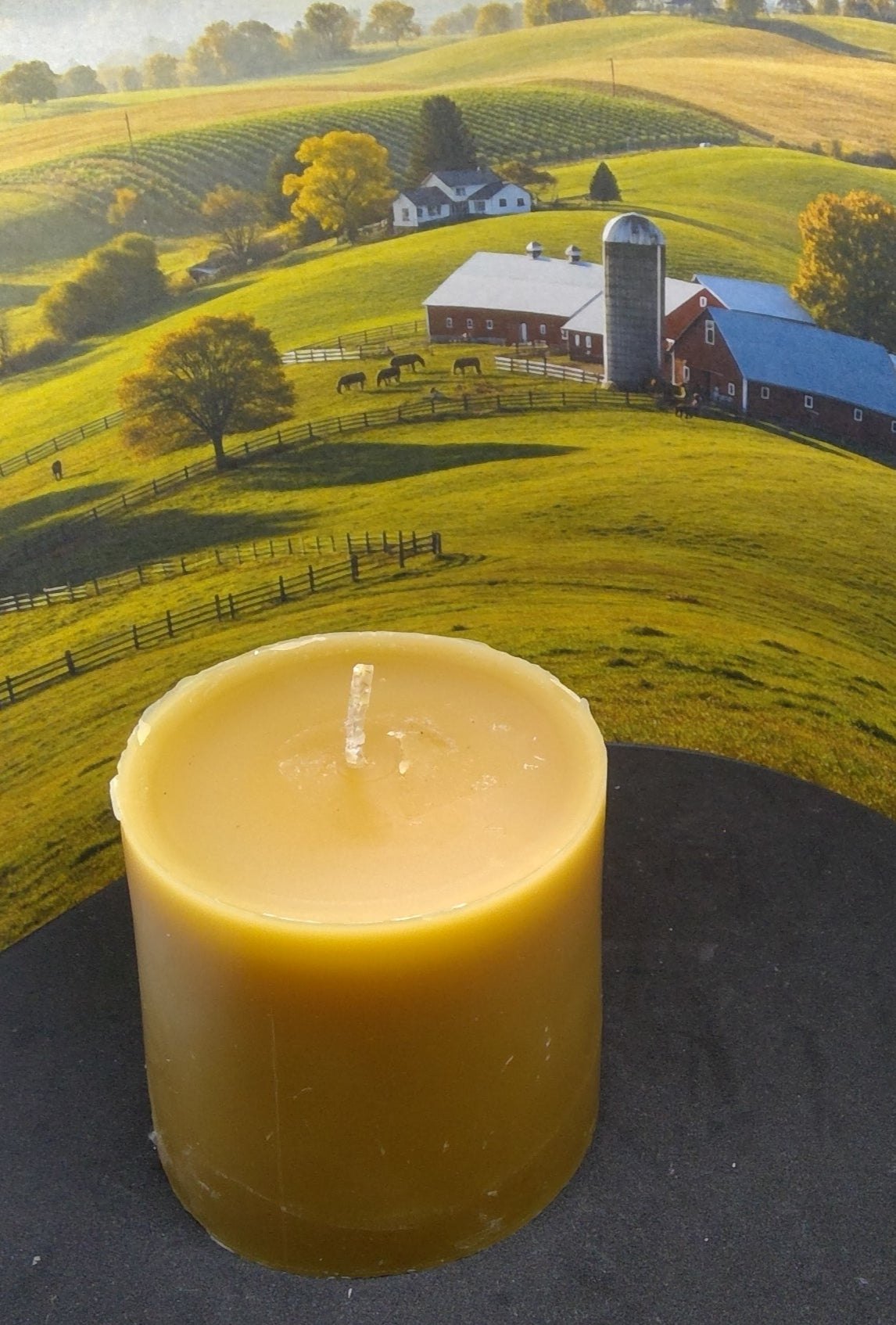 Golden yellow beeswax cylinder pillar candle