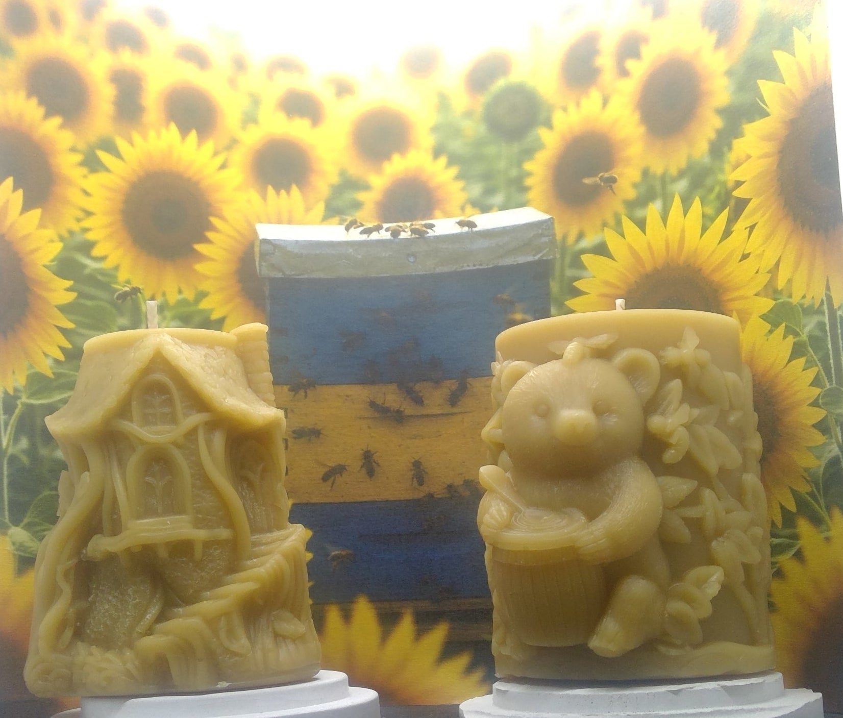Golden yellow beeswax bear and cabin pillar candle
